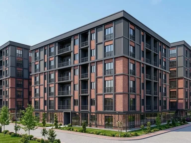 Modern, çok katlı bir konut binası, kırmızı tuğla cephe ve gri metal detaylarla.